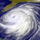 The vacant eye of the unnamed storm fixes its baleful stare on the Florida peninsula.